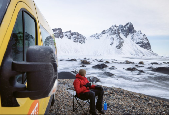 man having tea break in happy campervan motorhome