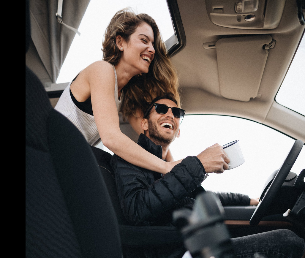 Two people on motorhome hire in cornwall